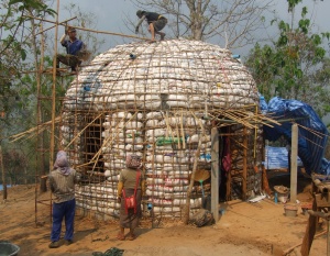 Pulley system to take buckets of straw dipped in a mix of cement and water to the top of the dome. 