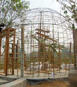 Bamboo lattice completes the bird cage.