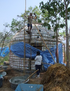 Beginning to cover the roof of the dome. 
